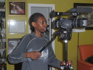 A picture of Darius Faison with a camera